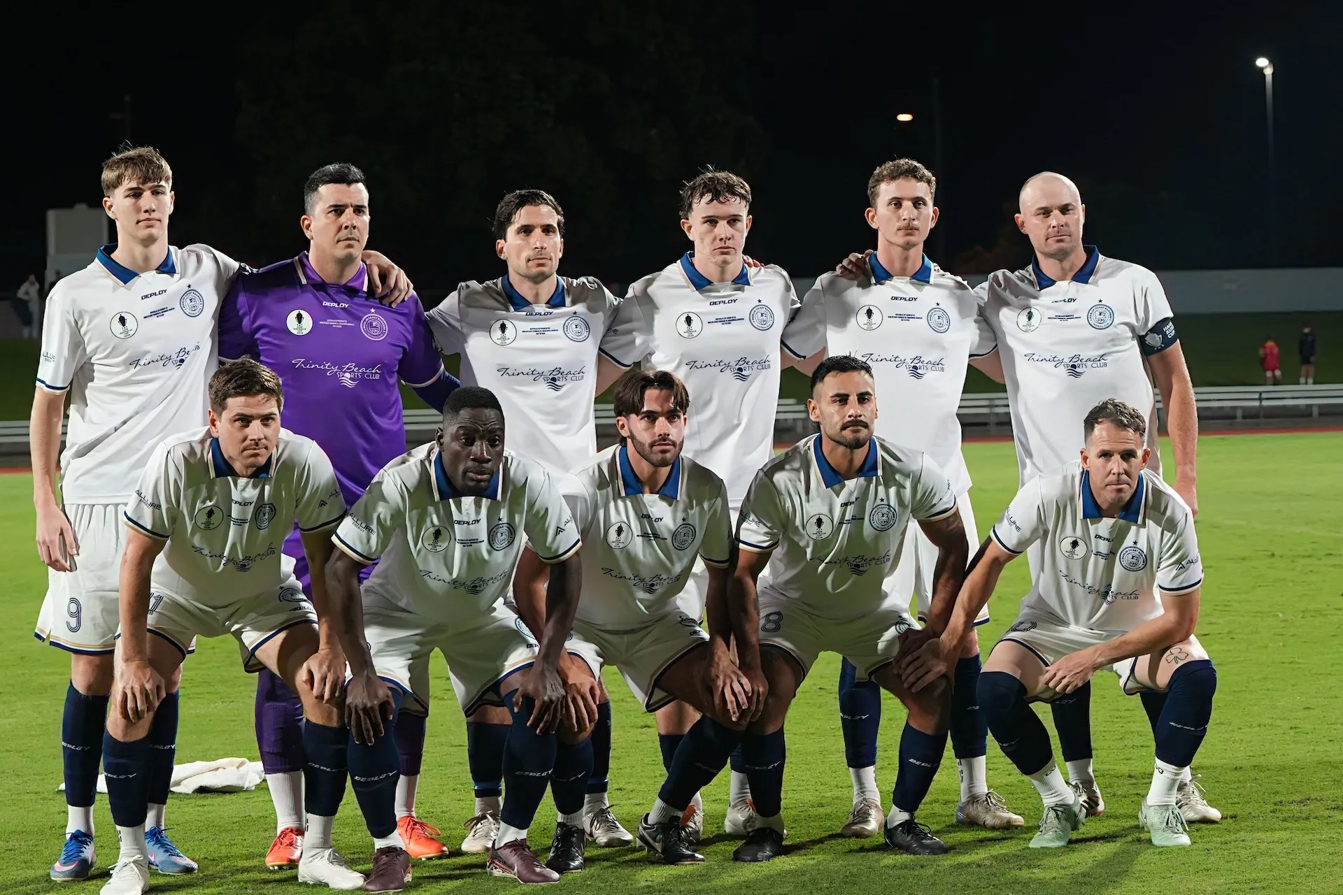 Marlin Coast Rangers senior first team lined up under lights at Pennell Field before kick-off